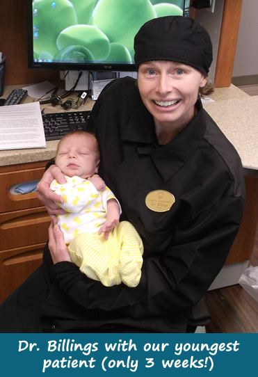 Dr. Billings with our youngest patient (3 weeks old) who received a Frenectomy